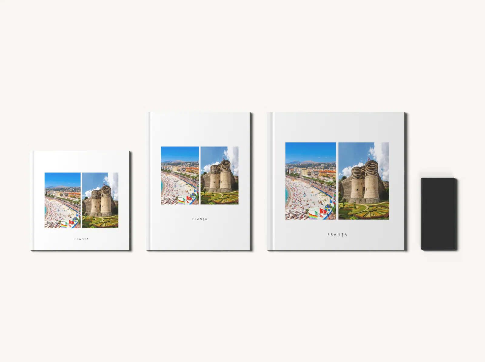 Albumul în tema Album clasic alb în formatele 20 × 20, 21 × 28 și 28 × 28 cm, la scară, lângă un telefon