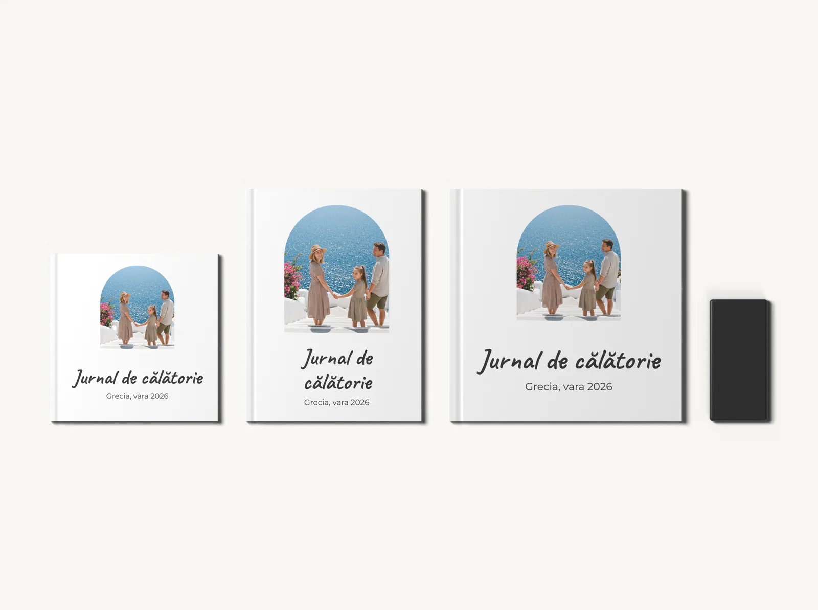 Albumul în tema Călătorii moderne în formatele 20 × 20, 21 × 28 și 28 × 28 cm, la scară, lângă un telefon
