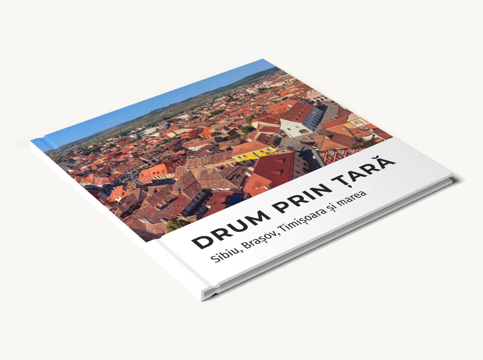 Albumul demo închis, văzut din lateral: coperta, cotorul și paginile, în tema Explorare
